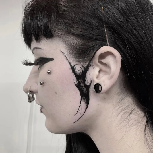 Medium Blackwork Webbing Tattoo on Women Face by @selenyilmaztattooist