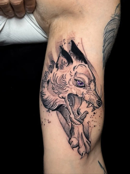 Medium Blackwork Wolf Head on Men Arm Tattoo by @lalita.tattoo
