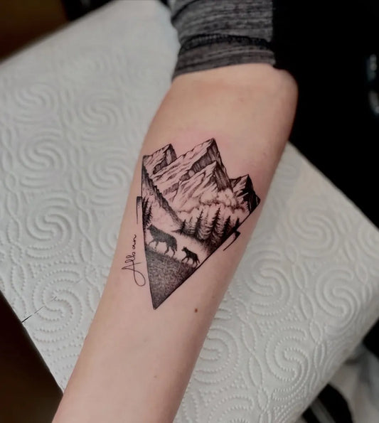 Medium Blackwork Wolf Mountains Trees on Women Forearm Tattoo by @badassstattoo