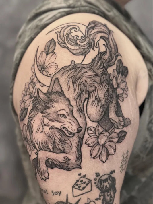 Medium Blackwork Wolf and Flowers on Men Arm Tattoo by @hillary_blair