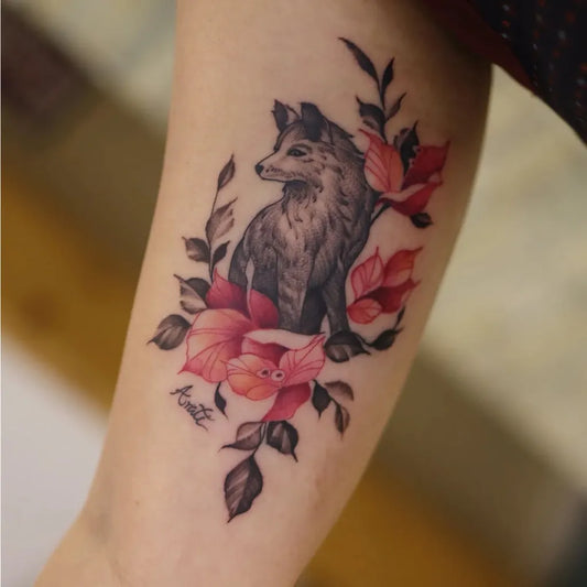 Medium Blackwork Wolf and Red Flowers Tattoo on Women Inner Arm by @zaheer_c