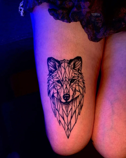 Medium Blackwork Wolf on Women Thigh Tattoo by @marko_tattoo_france