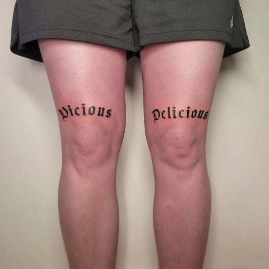 Medium Blackwork Word Tattoo on Women Knee by @spoopy.ca