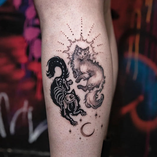 Medium Blackwork Yin Yang Cats Tattoo on Women Calf by @sashatattoo.nyc