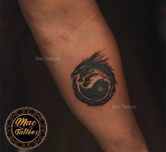 Medium Blackwork Yin Yang Dragon Tattoo on Men Arm by @mac_tattoos_original