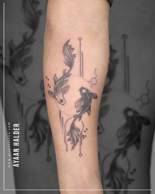 Medium Blackwork Yin Yang Koi and Molecule Tattoo on Men Arm by @ariestattoonoida