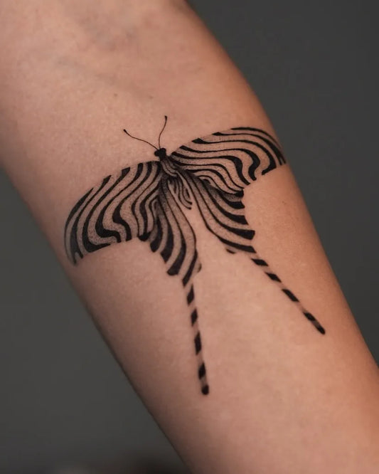 Blackwork Zebra Moth on Women Forearm Tattoo by @inker_land