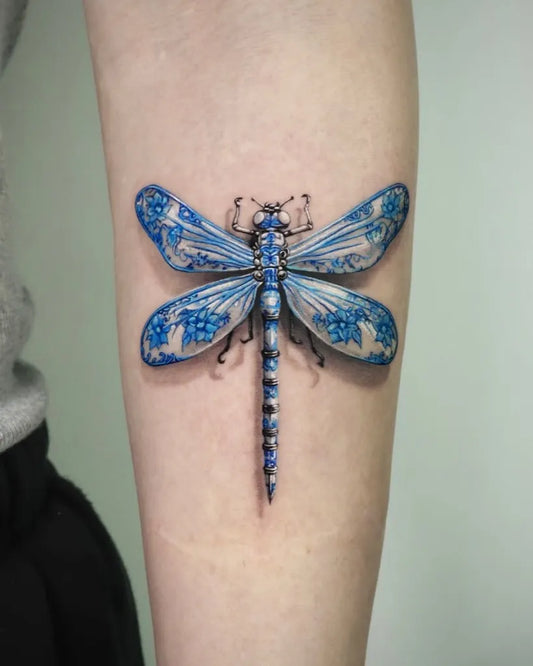 Medium Blue Dragonfly Tattoo on Women Arm by @txttooing