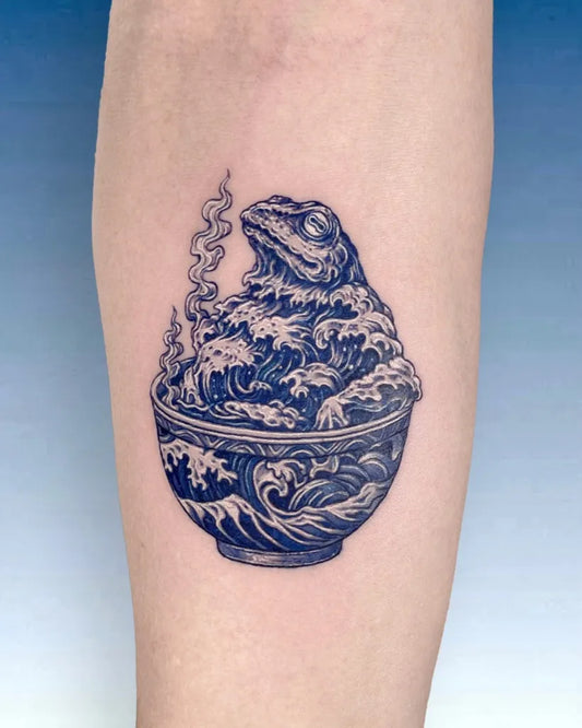 Medium Blue Frog in Waves Bowl Tattoo on Women Arm by @c.i.e.l_tt