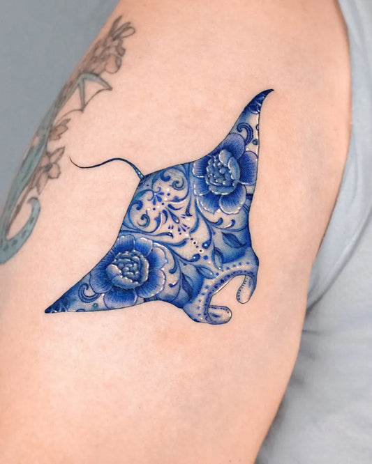 Medium Blue Manta Ray Tattoo on Women Arm by @e.nal.tattoo