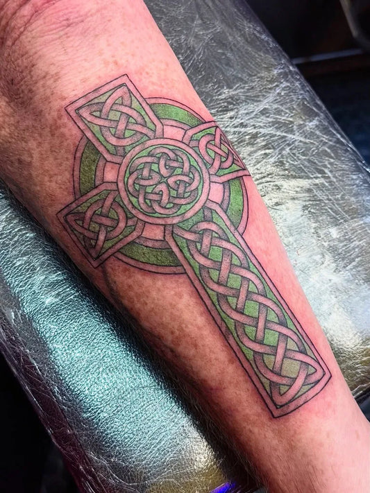 Medium Celtic Celtic Cross Tattoo on Men Arm by @bizarreinktattoosedinburgh