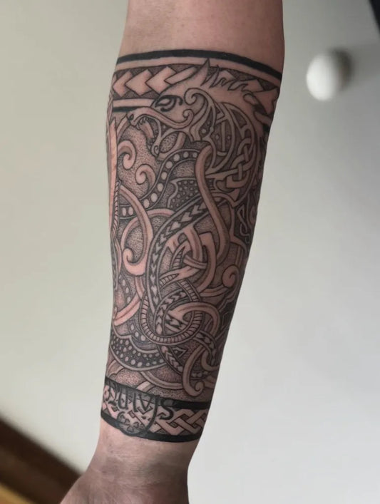 Medium Celtic Interlaced Serpents and Knots Tattoo on Men Forearm by @mine.rst_tattoo