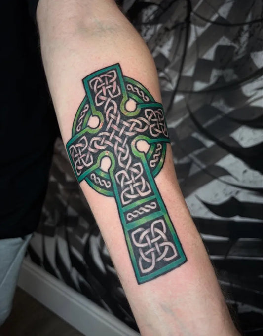 Medium Celtic Knot Cross Tattoo on Men Arm by @leelou_tattoos