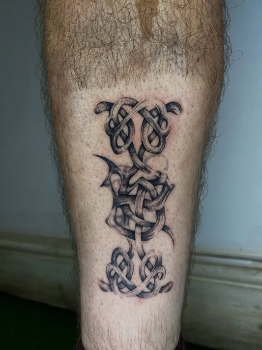 Medium Celtic Knot Design Tattoo on Men Leg by @thegreengoblinnn