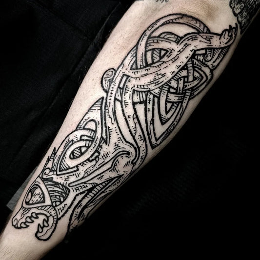 Medium Celtic Knot Interlace Tattoo on Men Arm by @joe__murphy__tattoo