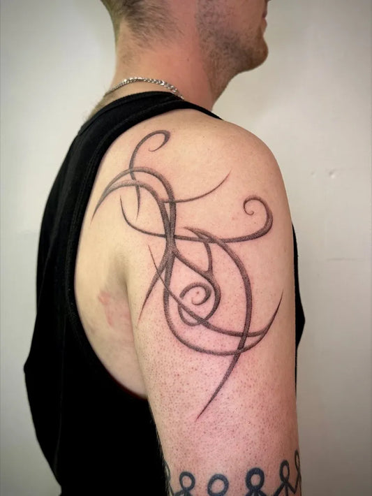 Medium Celtic Knotwork Tattoo on Men Shoulder by @dj__peanut