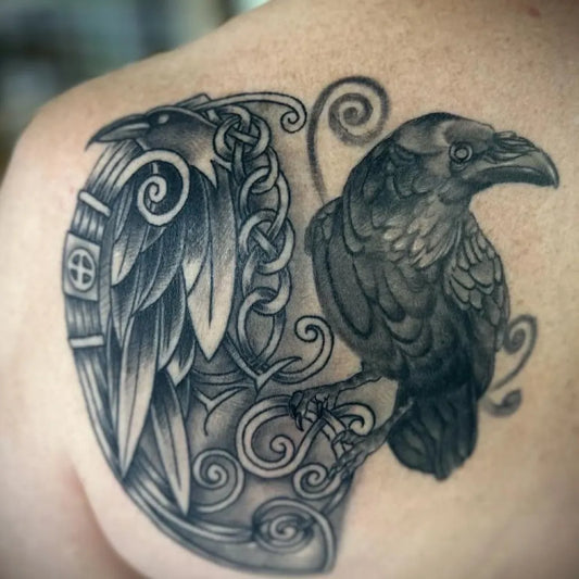 Medium Celtic Raven Knot Tattoo on Men Shoulder by @themeanmachinegroesbeek