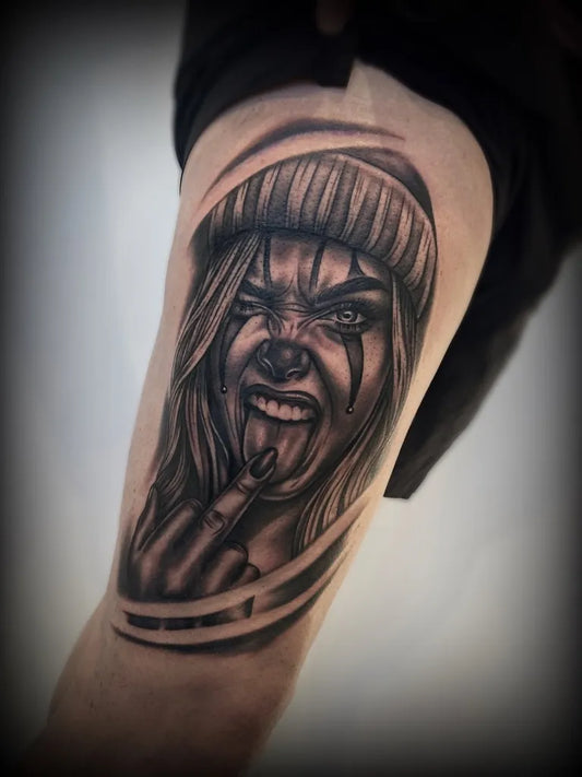 Medium Chicano Female with tear streaked face wearing beanie Tattoo on Women Thigh by @inkbyheather_