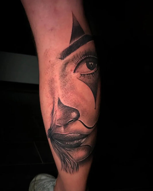 Medium Chicano Half Jester Face Tattoo on Women Leg by @skyline_tattoo_schrobenhausen