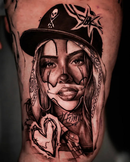 Medium Chicano Woman in Cap with Teardrops and Heart Tattoo on Women Arm by @thoresharpztattoo