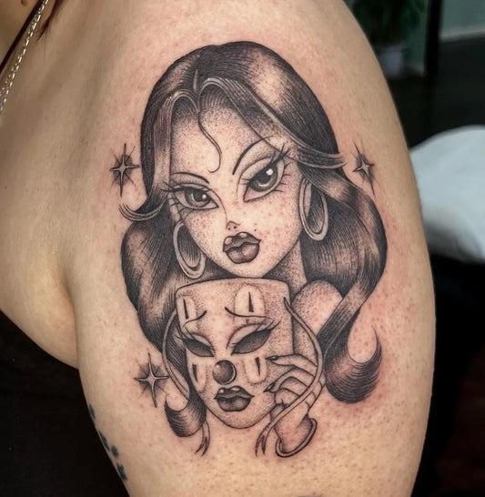 Medium Chicano Woman with Mexican Mask Tattoo on Women Bicep by @sweetneedlestattoo