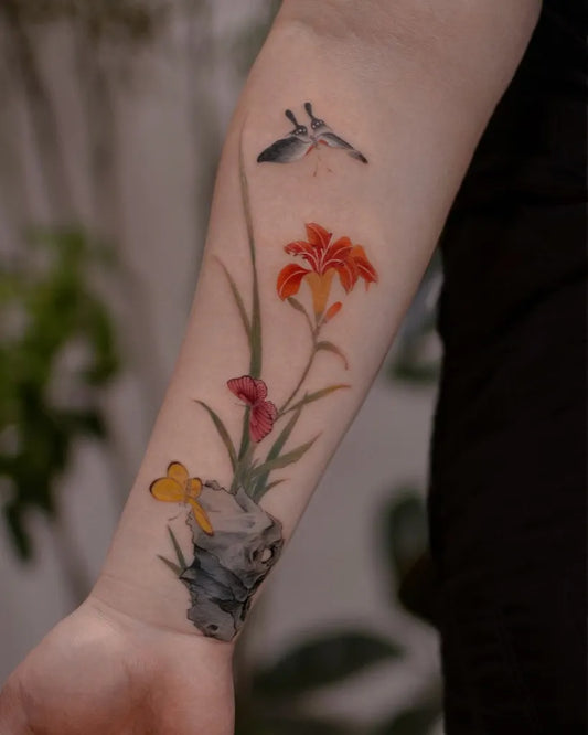 Medium Chinese Flowers Butterfly Skull Tattoo on Women Arm by @inkflow_double