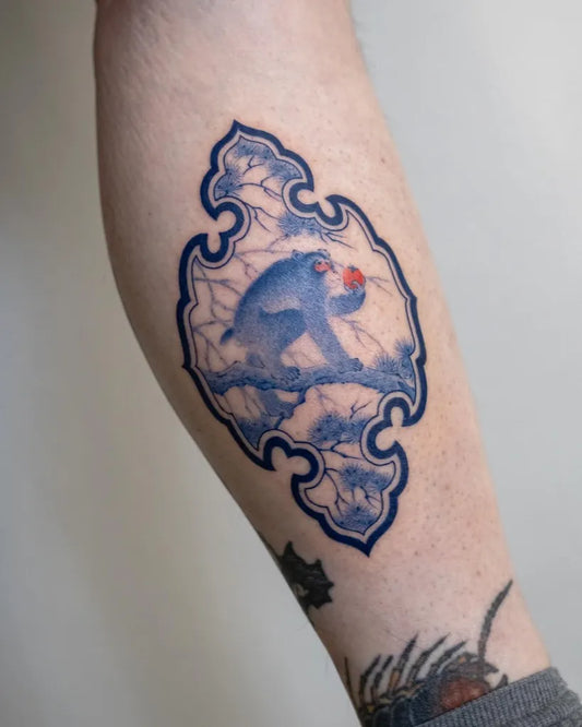 Medium Chinese Monkey in Blue Frame Tattoo on Men Forearm by @saki.lss