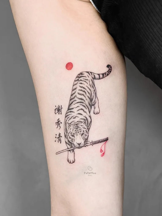 Medium Chinese White Tiger with Sword Tattoo on Women Arm by @po.tattoo.studio