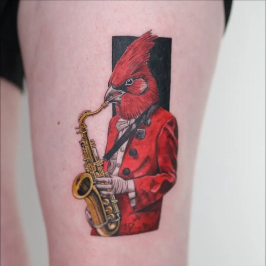 Medium Color Realism Cardinal Playing Saxophone Tattoo on Women Thigh by @captainshade.tt