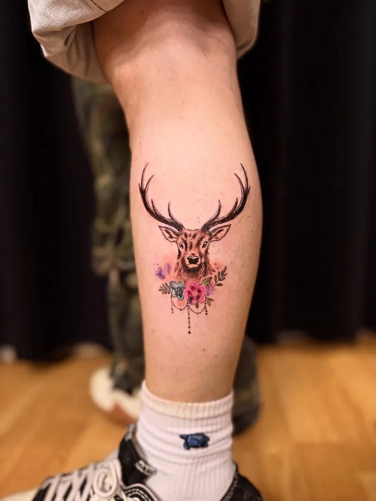 Medium Color Realism Deer with Flowers Tattoo on Men Leg by @doganbalta.tattoo