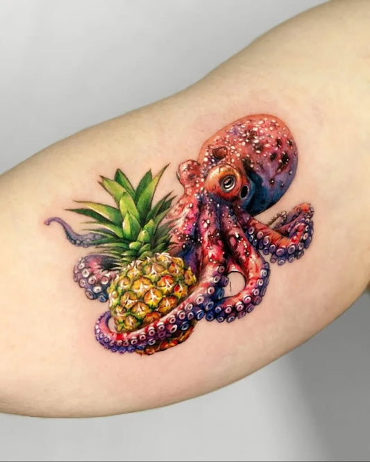 Medium Color Realism Octopus and Pineapple Tattoo on Women Arm by @369.inkstudio