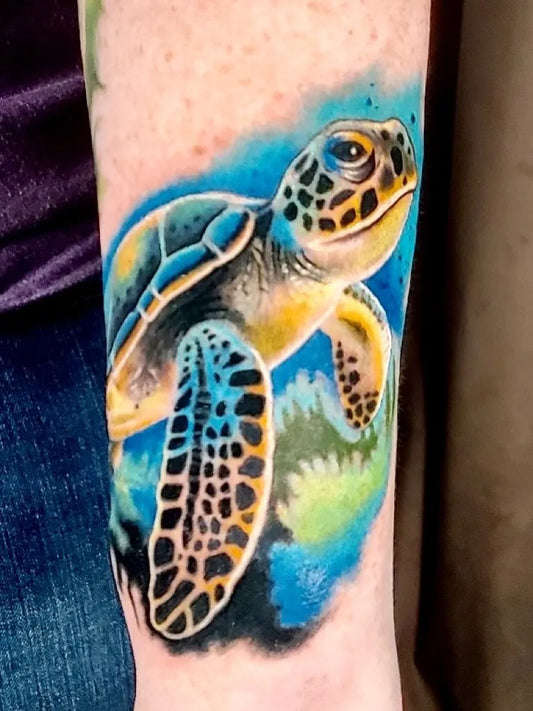 Medium Color Realism Sea Turtle Tattoo on Women Arm by @midnightmoontattoo