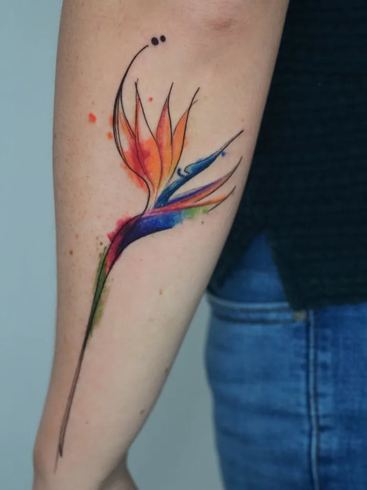 Medium Colorful Bird of Paradise Flower Tattoo on Women Arm by @little.rennn