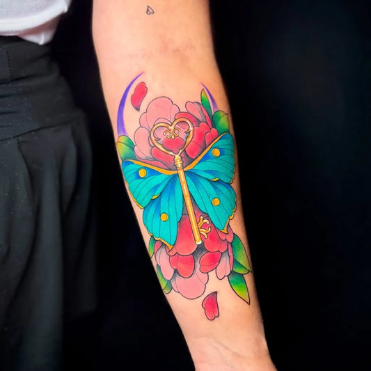 Medium Colorful Butterfly Peony Tattoo on Women Arm by @thejavitattoo