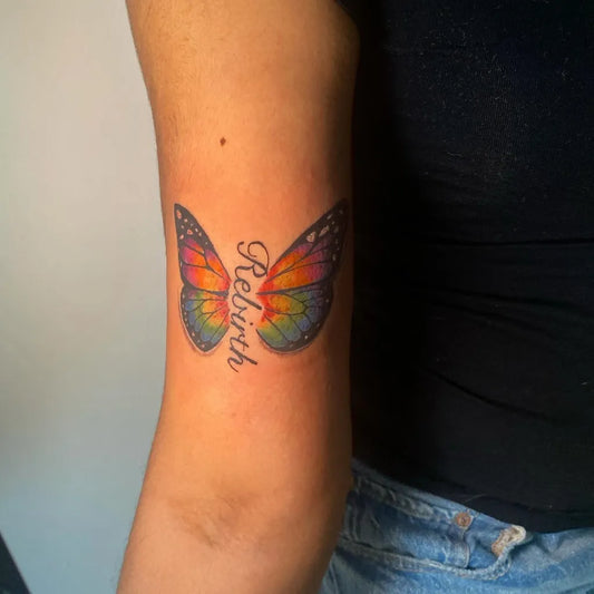Medium Colorful Butterfly Rebirth on Women Arm Tattoo by @tj_111tattoos
