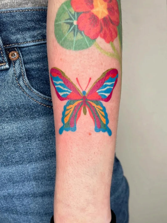 Medium Colorful Butterfly and Lotus Tattoo on Women Arm by @kikipokie