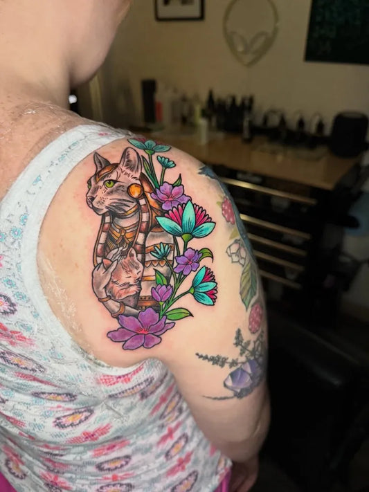 Medium Colorful Cat and Flowers Tattoo on Women Shoulder by @inked_by_k