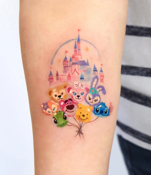 Medium Colorful DisneyCastleWithCharacters Tattoo on Women Arm by @ovenlee.tattoo