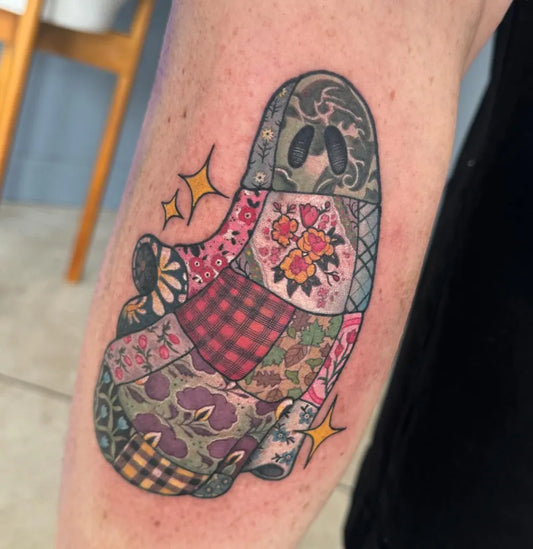 Medium Colorful Patchwork Ghost Tattoo on Women Arm by @rachelsmithtattoo