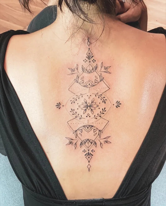 Medium Delicate Moon Phases Mandala Tattoo on Women Back by @mmac.ttt