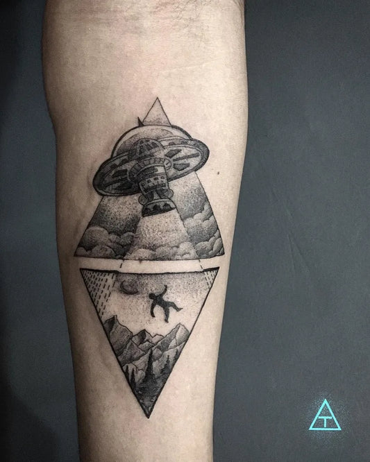 Medium Dotwork Alien UFO and Mountains Tattoo on Men Arm by @birthmarktattooncustoms
