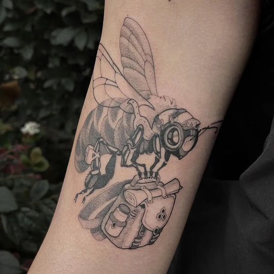 Medium Dotwork Bee with Backpack and Goggles on Men Arm Tattoo by @chibi_raccoon_tattoo
