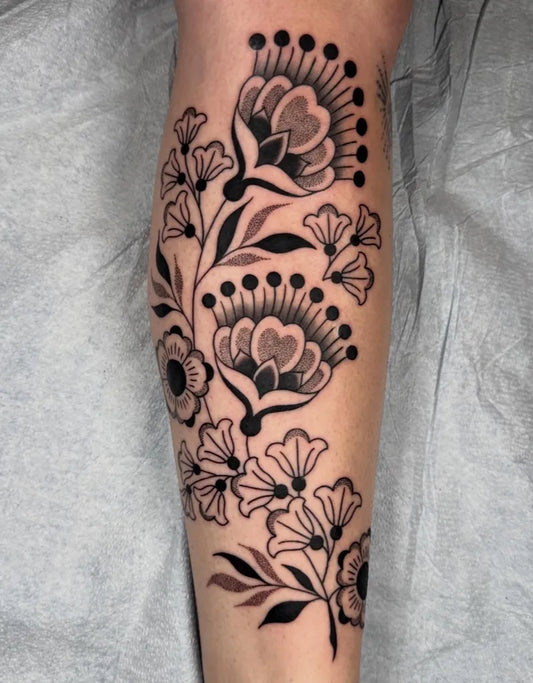Medium Dotwork Floral Branch Tattoo on Women Leg by @liana_joy_tattoo