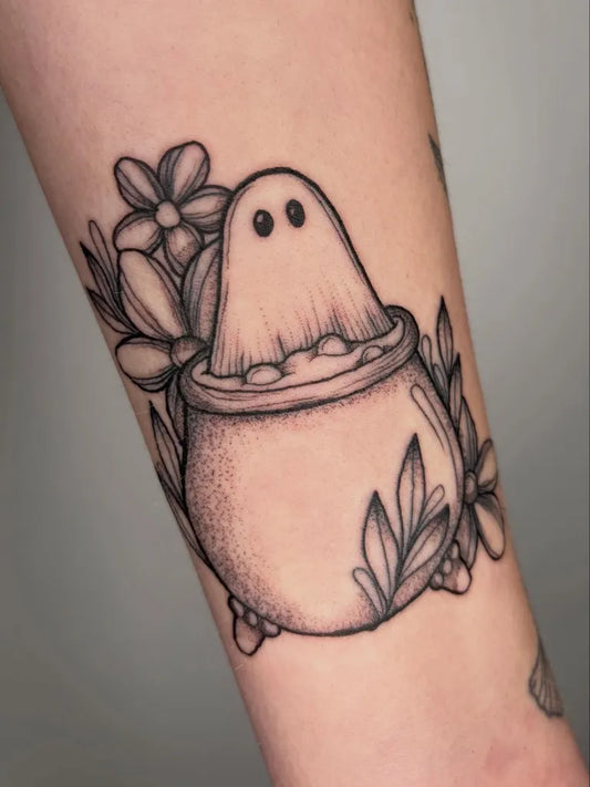 Medium Dotwork Ghost in Pot with Flowers Tattoo on Women Arm by @poppyoliviatattoo