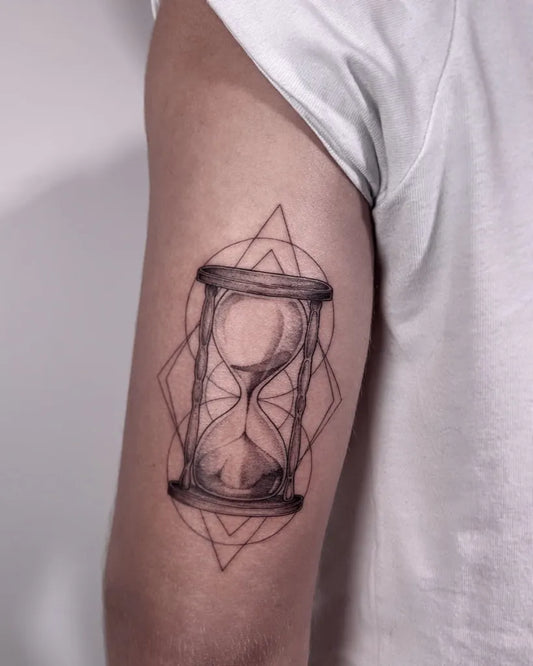 Medium Dotwork Hourglass Tattoo on Men Arm by @madlen.tattoo