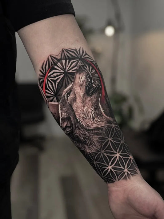 Medium Dotwork Howling Wolf with Geometric Mandala Tattoo on Men Arm by @rinktattoos