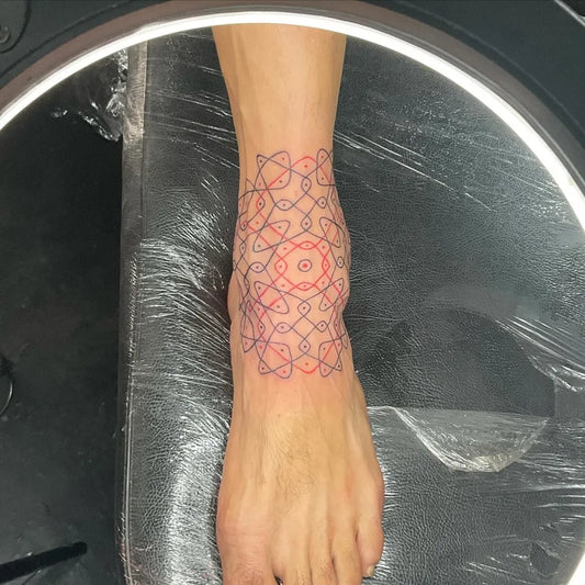 Medium Dotwork Mandala Knot Tattoo on Women Ankle by @cosmicinktattoos