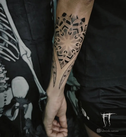 Medium Dotwork Mandala Tattoo on Men Arm by @fabrink.tattoo
