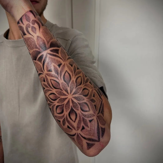 Medium Dotwork Mandala Tattoo on Men Arm by @kayecoppoolse