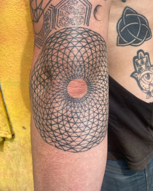 Medium Dotwork Mandala Tattoo on Men Elbow by @jeshurteau